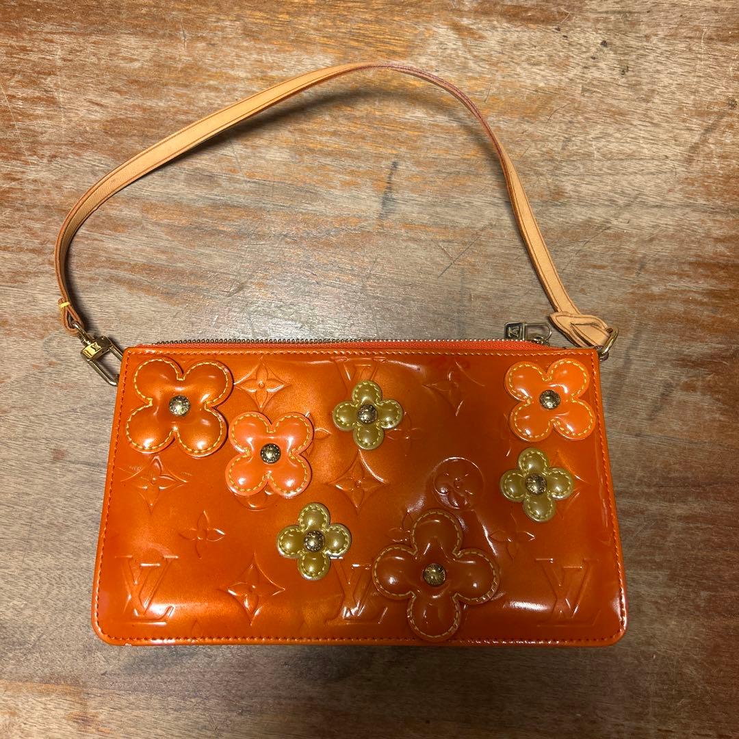 ルイヴィト　オレンジ 花柄 エンボス ポーチ