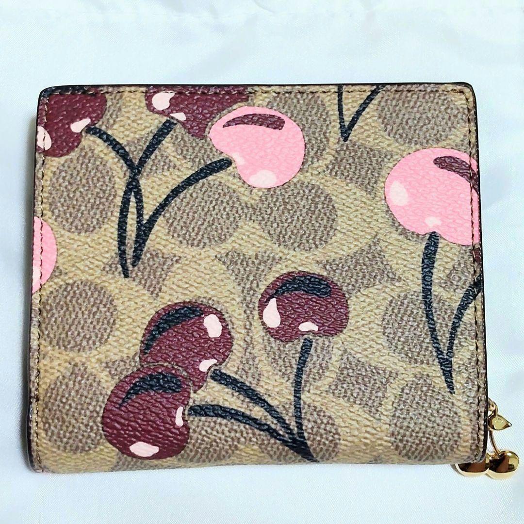 COACH チェリープリントシグネチャー スナップ二つ折り財布 ミニウォレット