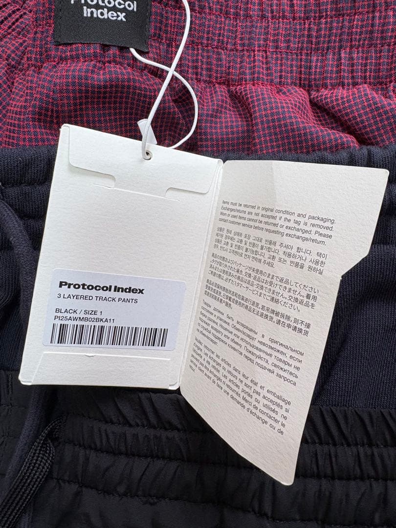 パンツ Protocol Index LAYERED TRACK PANTS / BLK
