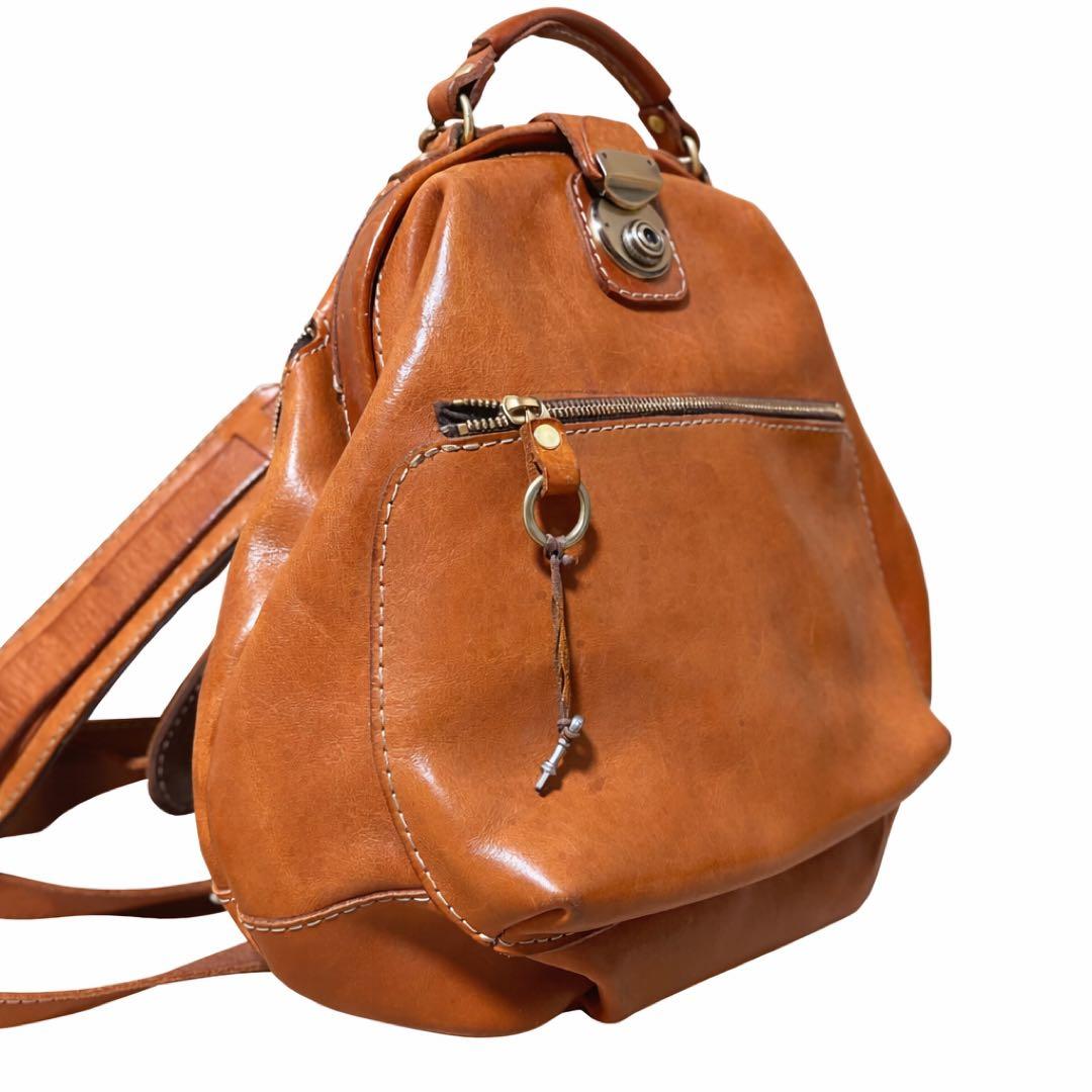 ヘルツ わんぱくリュック がま口 レザー バックパック ロック金具 鍵付き 茶