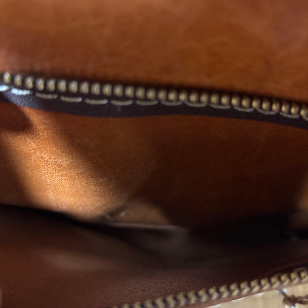 ヘルツ わんぱくリュック がま口 レザー バックパック ロック金具 鍵付き 茶