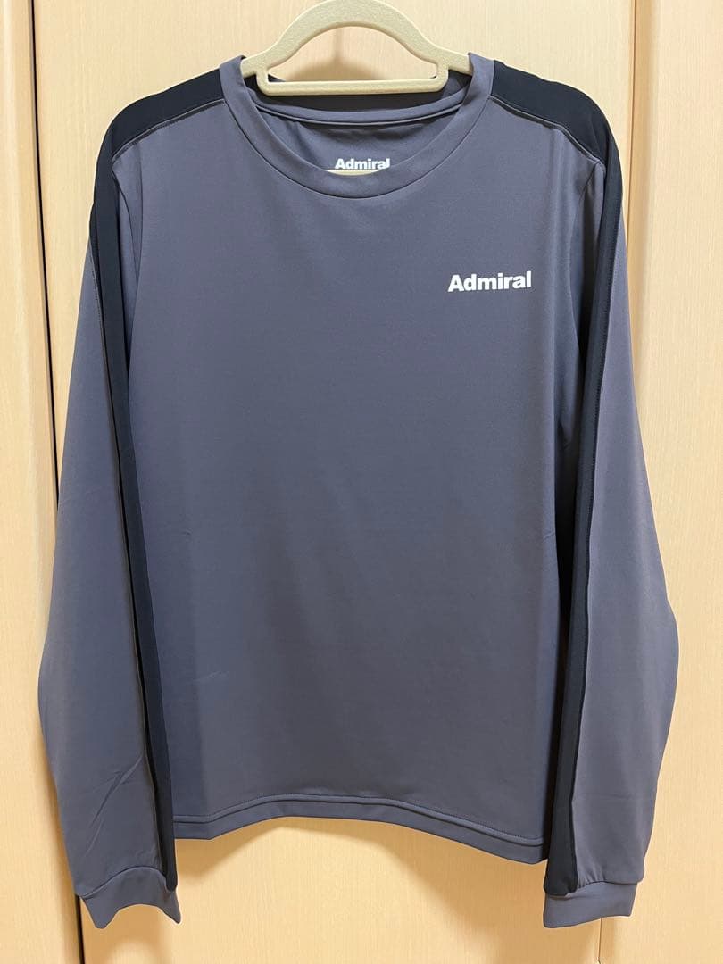 アドミラル ミニマムサイドラインL/S TEE チャコール(ATLA438)