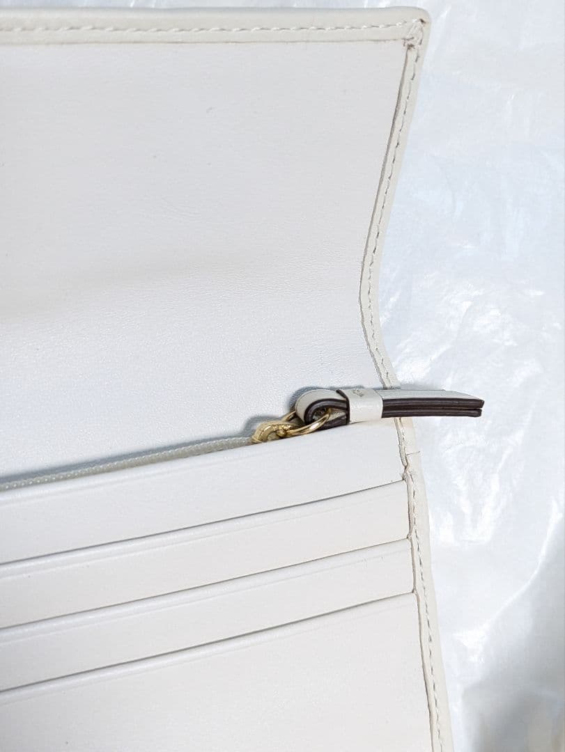 COACH コーチ　三つ折り財布 ピンクと紫のパターンシグネチャー未使用品