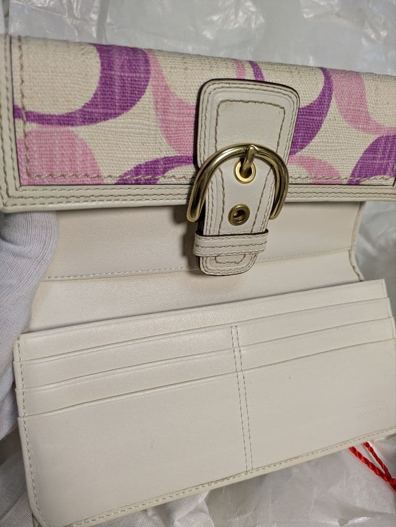 COACH コーチ　三つ折り財布 ピンクと紫のパターンシグネチャー未使用品