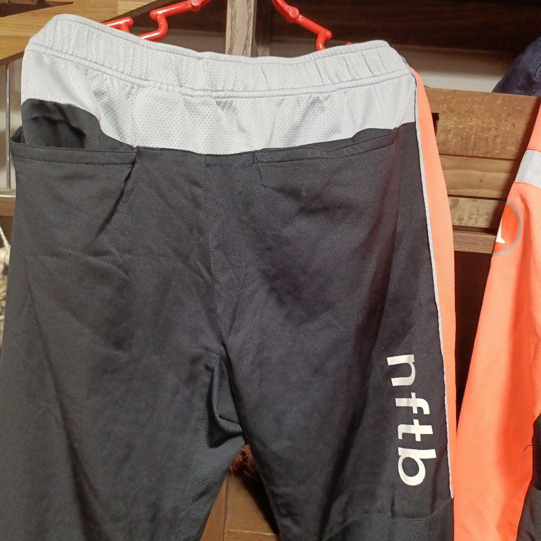 NIKE ナイキ nftb 薄手ジャージ 上下 セットアップ L 蛍光オレンジ色
