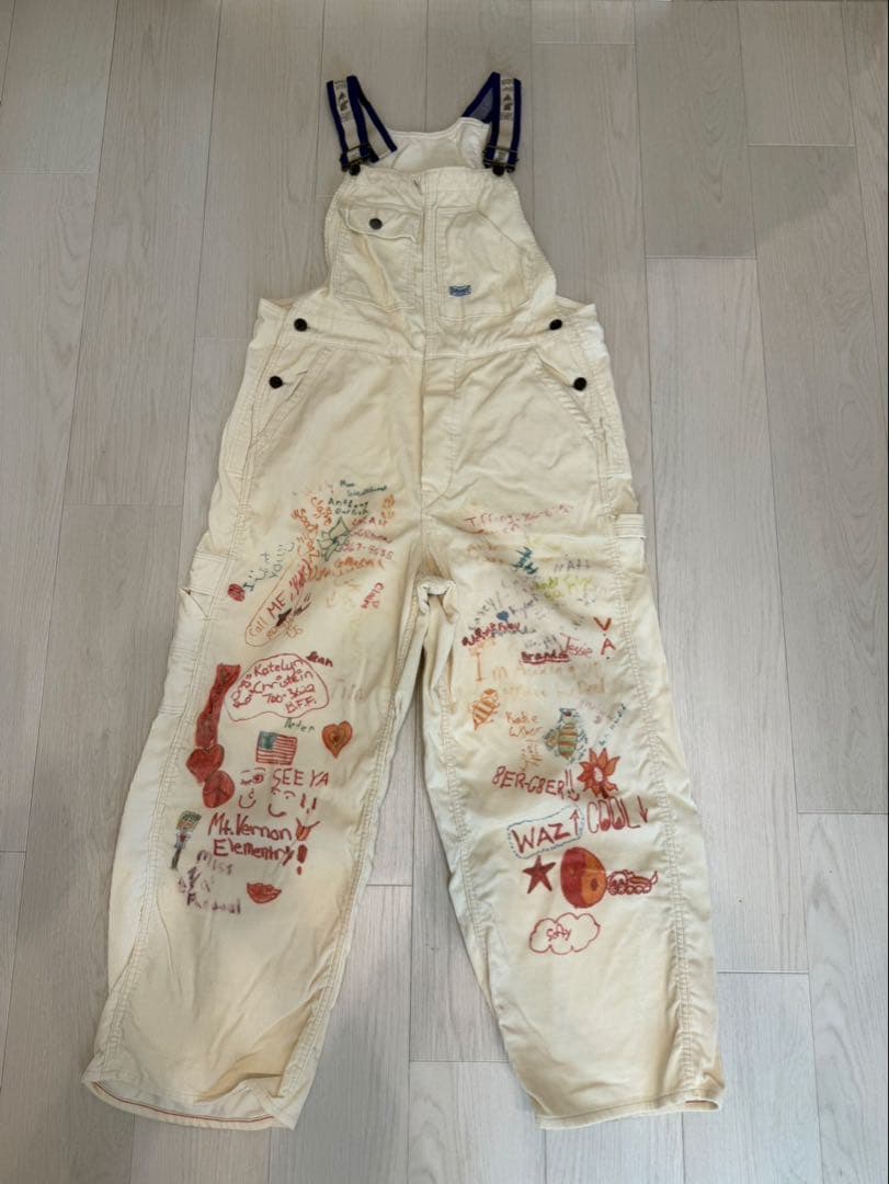 手描きイラスト付きクリーム色サロペット