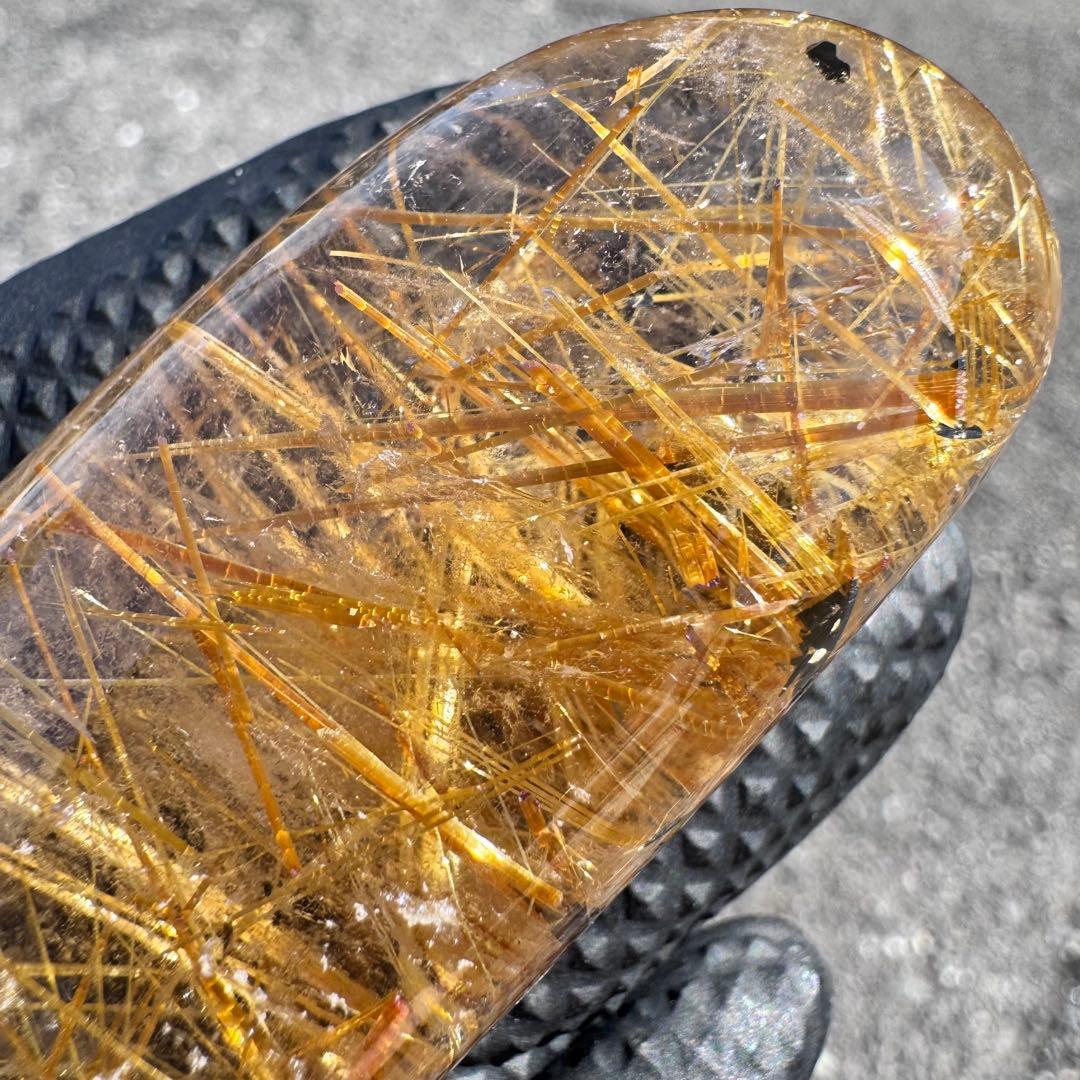 G-178タイチンルチル研磨石　ゴールドルチル放射状原石　天然石119g