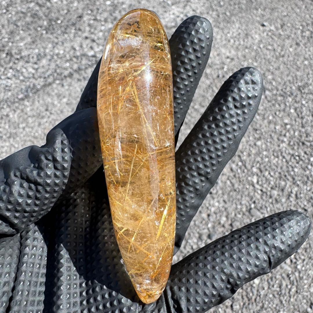 G-178タイチンルチル研磨石　ゴールドルチル放射状原石　天然石119g