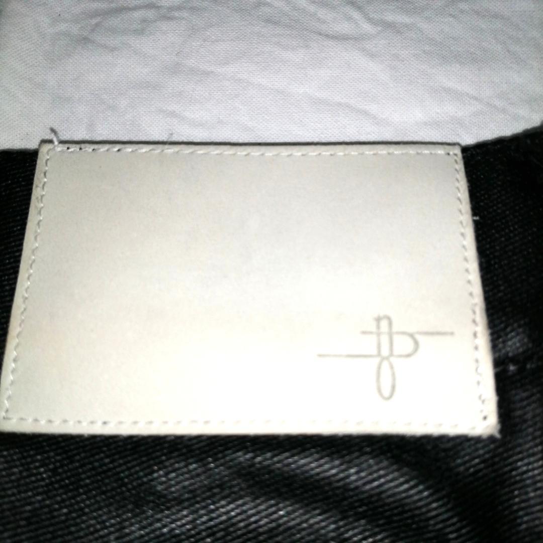 no id black コーティングストレッチベルテッドスキニー