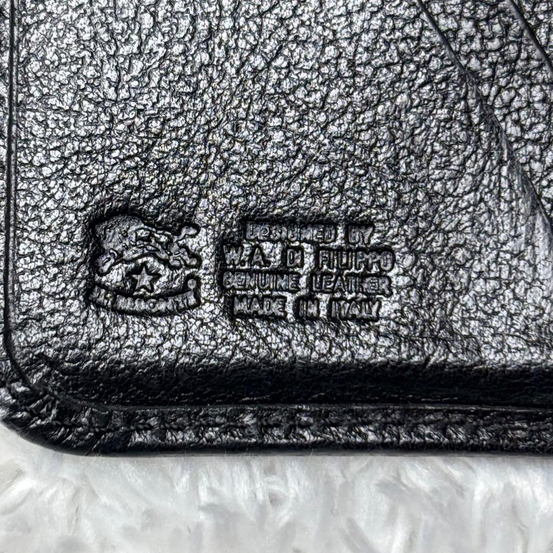 IL BISONTE イルビゾンテ 二つ折り財布 黒 ラウンドジップ 金ボタン