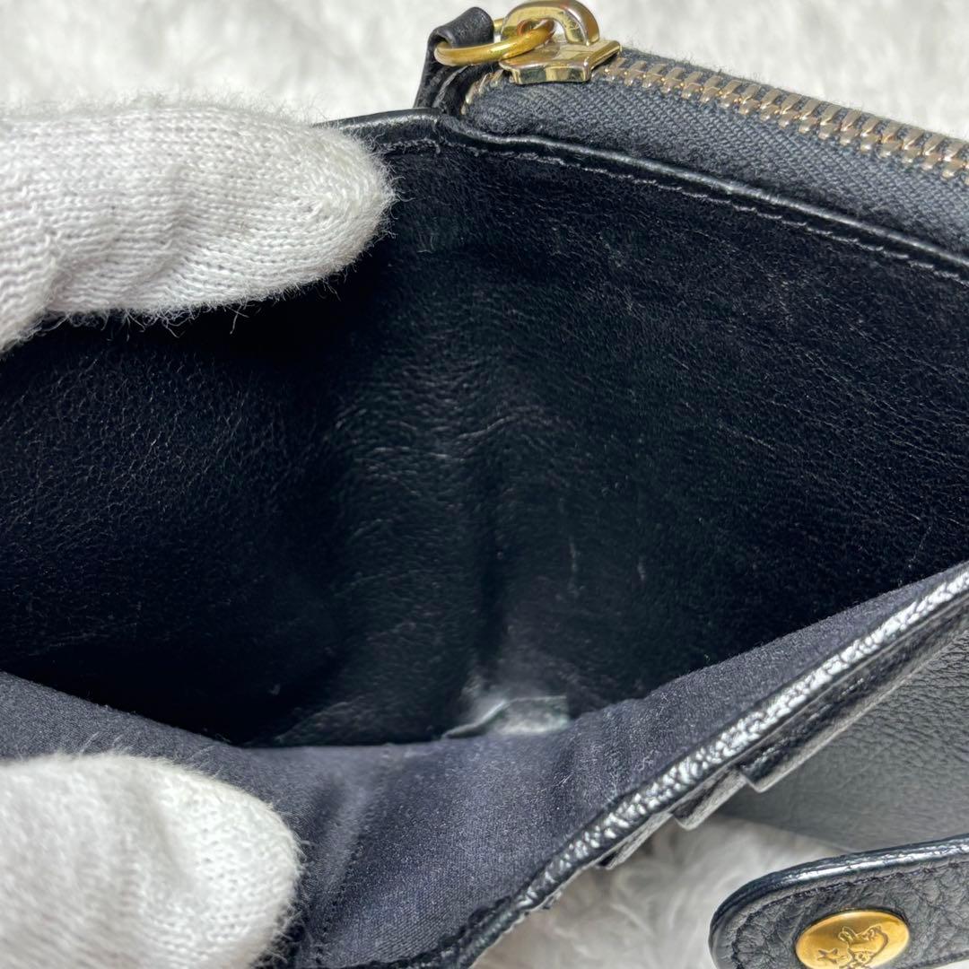 IL BISONTE イルビゾンテ 二つ折り財布 黒 ラウンドジップ 金ボタン