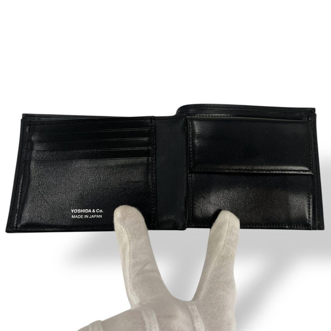 ポーター　プリュム　二つ折り財布　ロゴプレート　コンパクトウォレット　レザー　黒