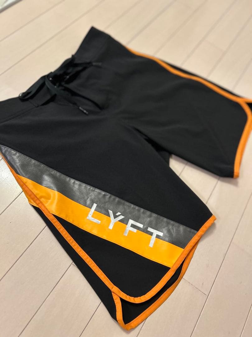 LYFT 【L】ステージショーツ　黒/オレンジ