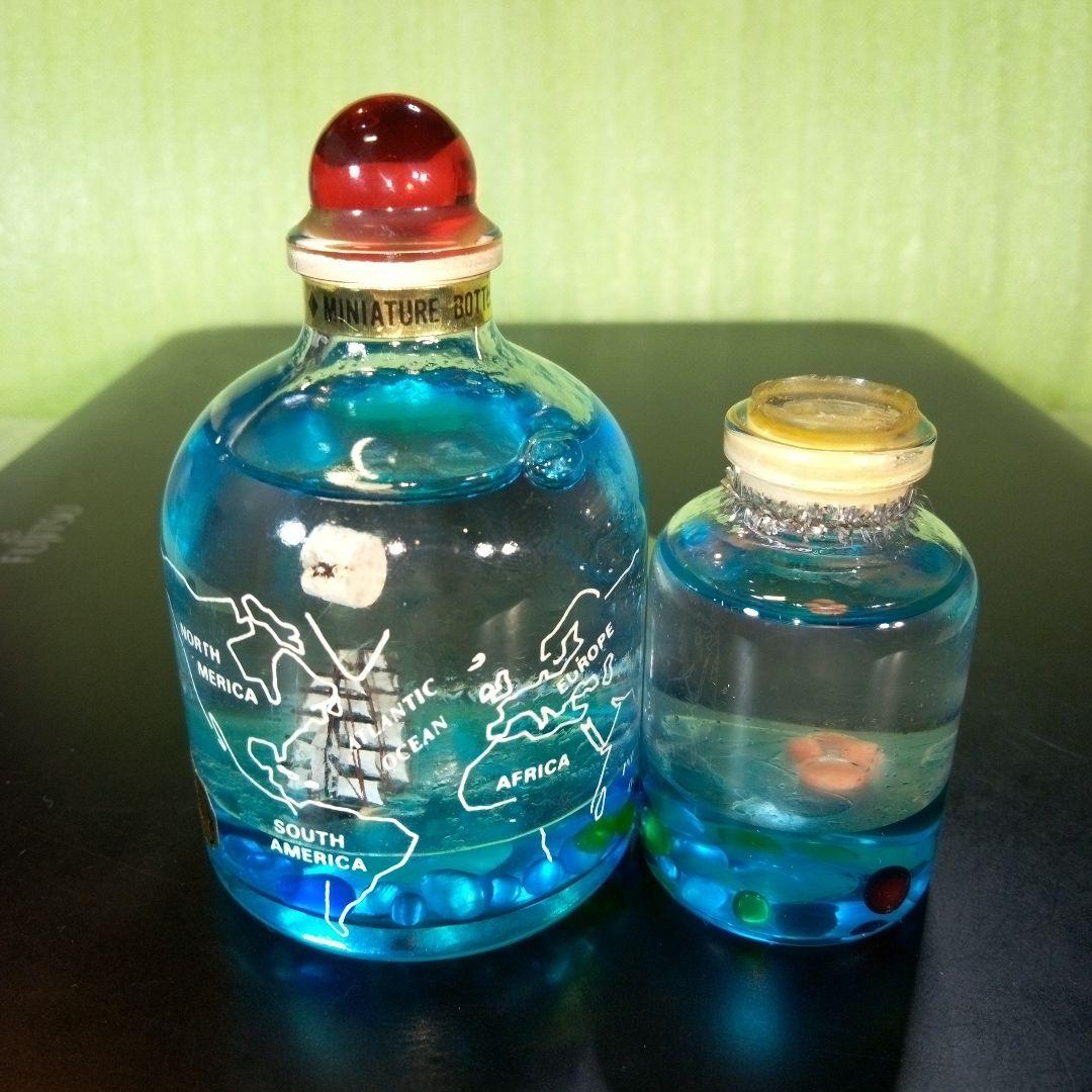 ①黒船　長崎オランダ村　ミニチュアボトル　②ラッコ　オイルドーム　①②セット