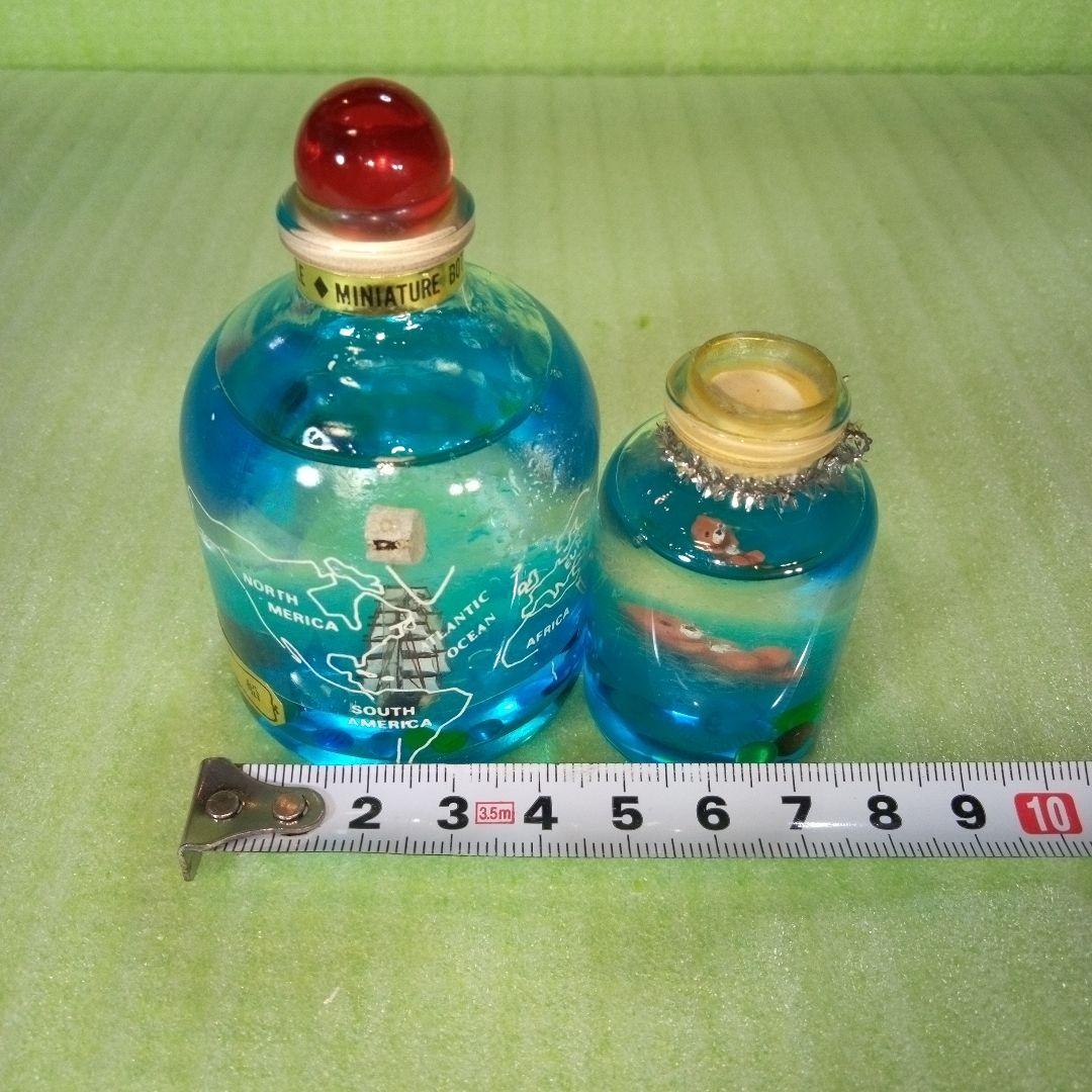 ①黒船　長崎オランダ村　ミニチュアボトル　②ラッコ　オイルドーム　①②セット