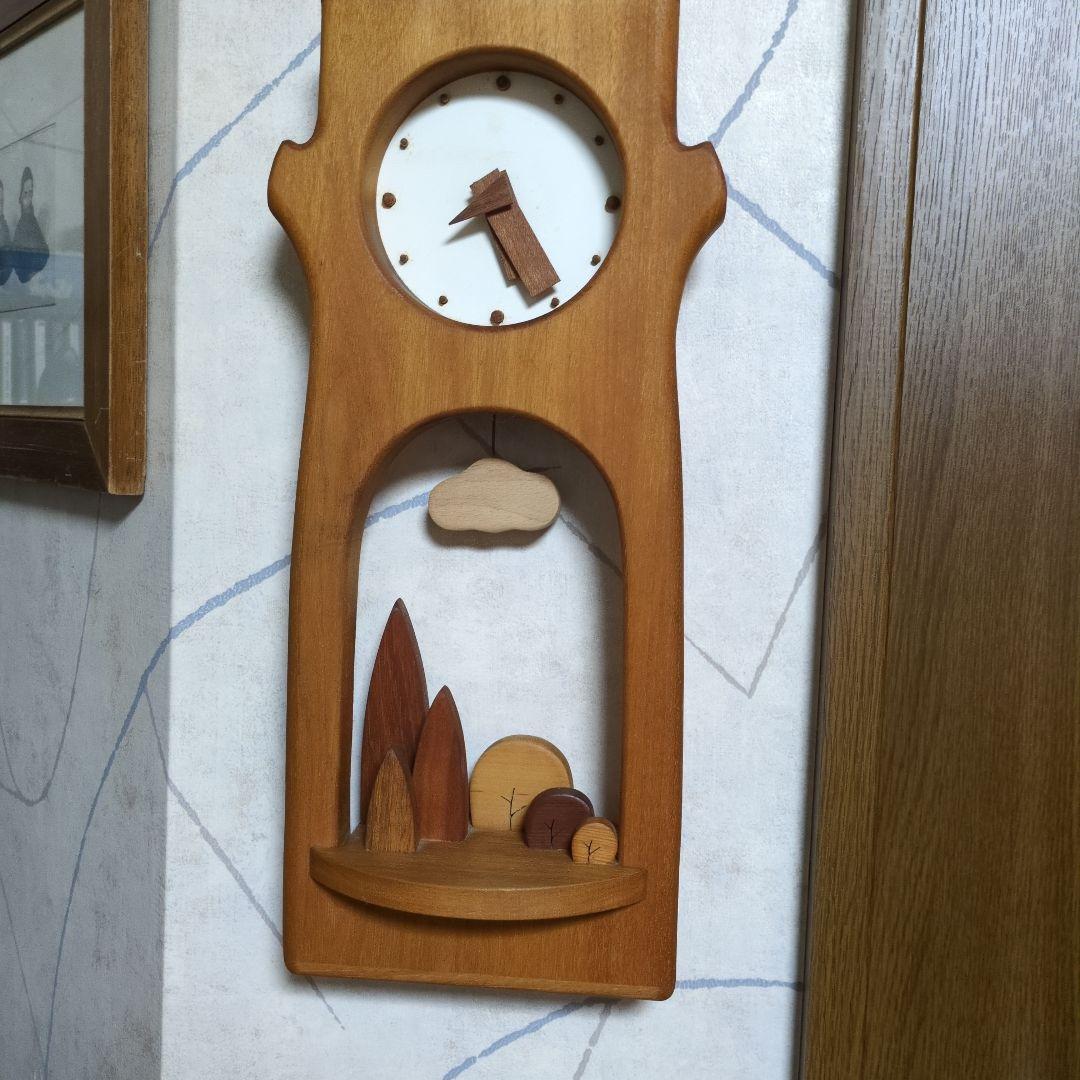 木製の自然テーマ掛時計
