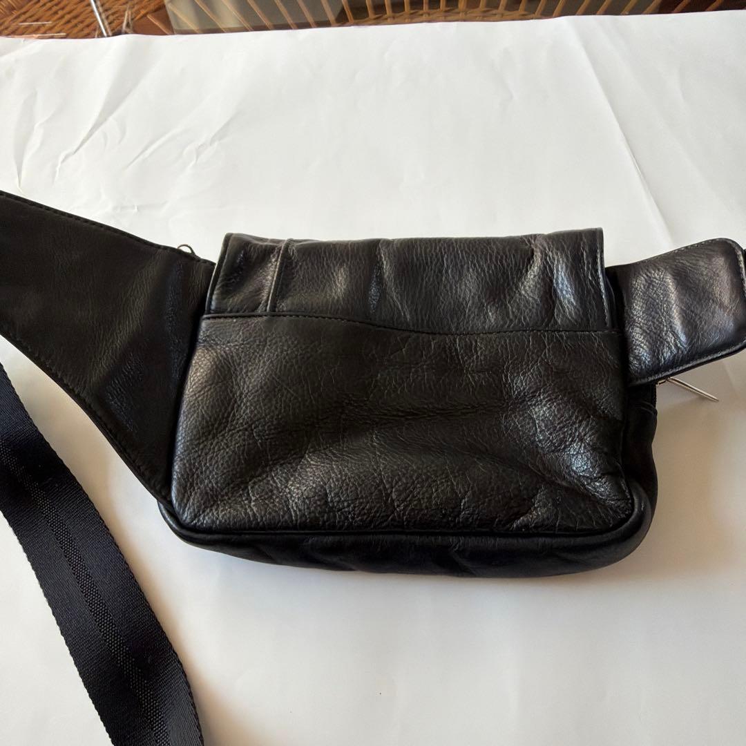 u*l様 TUMI/・トゥミイ黒 レザー ボディバッグ ウエストポーチフラップ付
