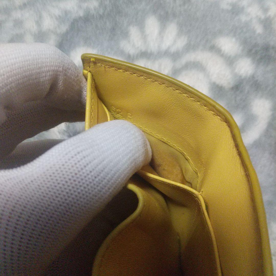 PRADA ヴェッテロムーブ　コンパクトウォレットイエロー 三つ折り財布