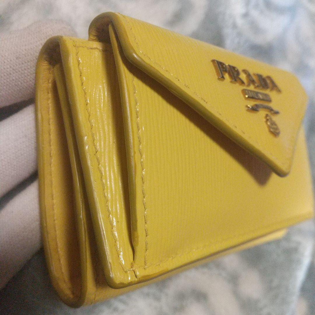 PRADA ヴェッテロムーブ　コンパクトウォレットイエロー 三つ折り財布