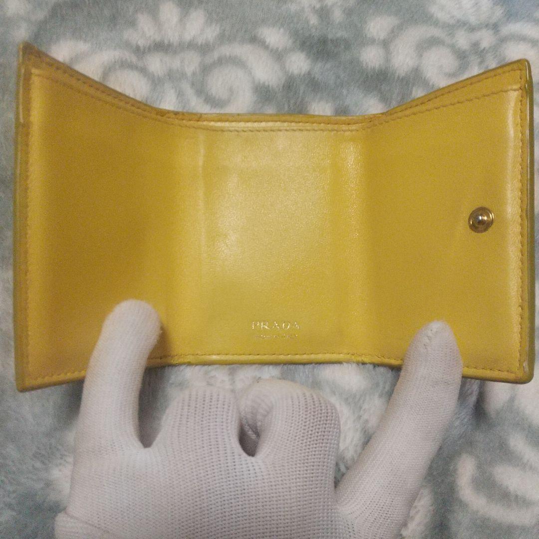 PRADA ヴェッテロムーブ　コンパクトウォレットイエロー 三つ折り財布