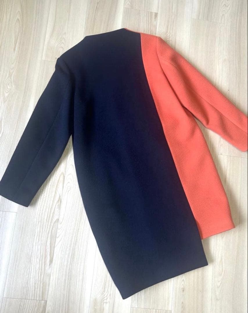 UN3D. アンスリード バイカラーアシンメトリーコート オレンジ×ネイビー