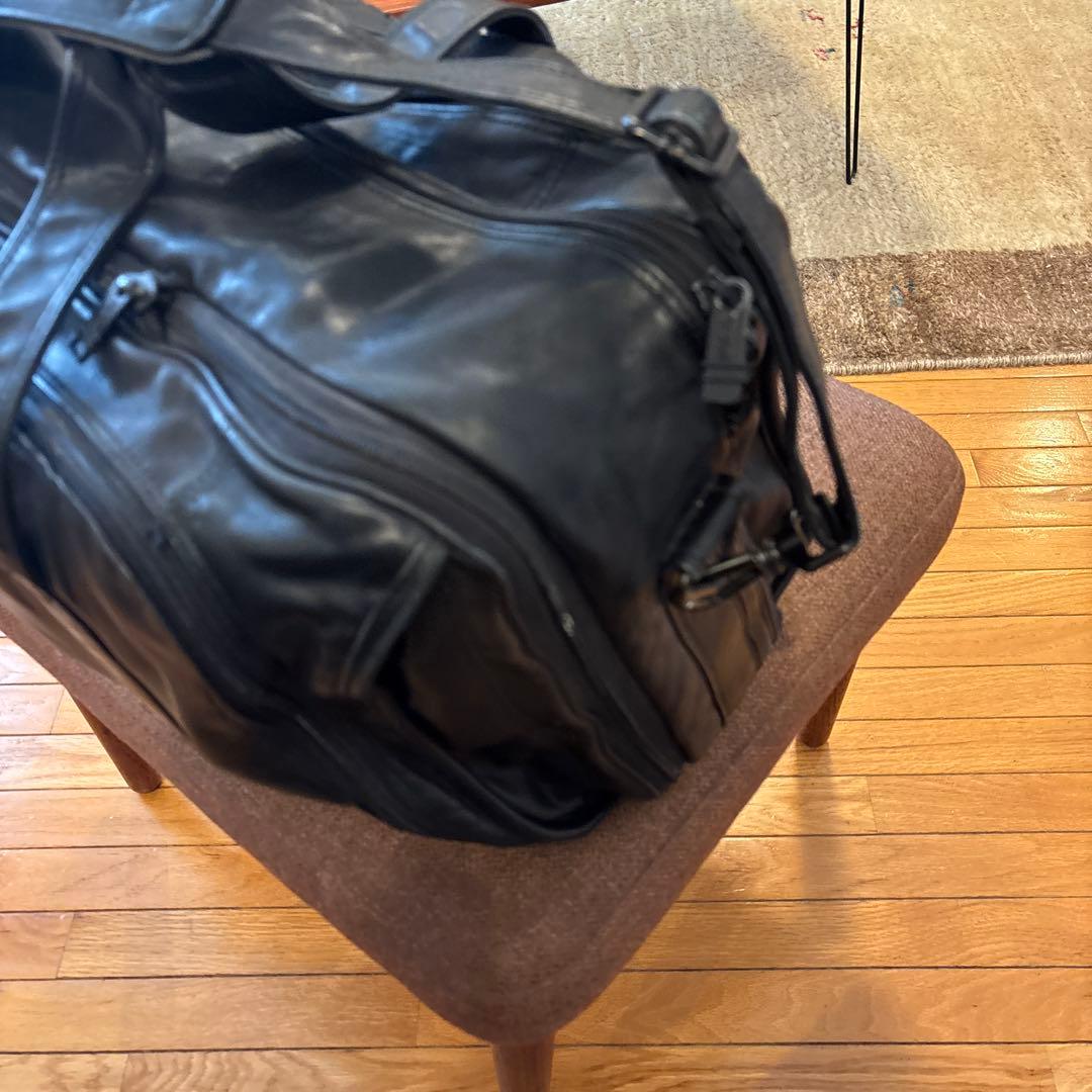 TUMI 革製旅行バッグ