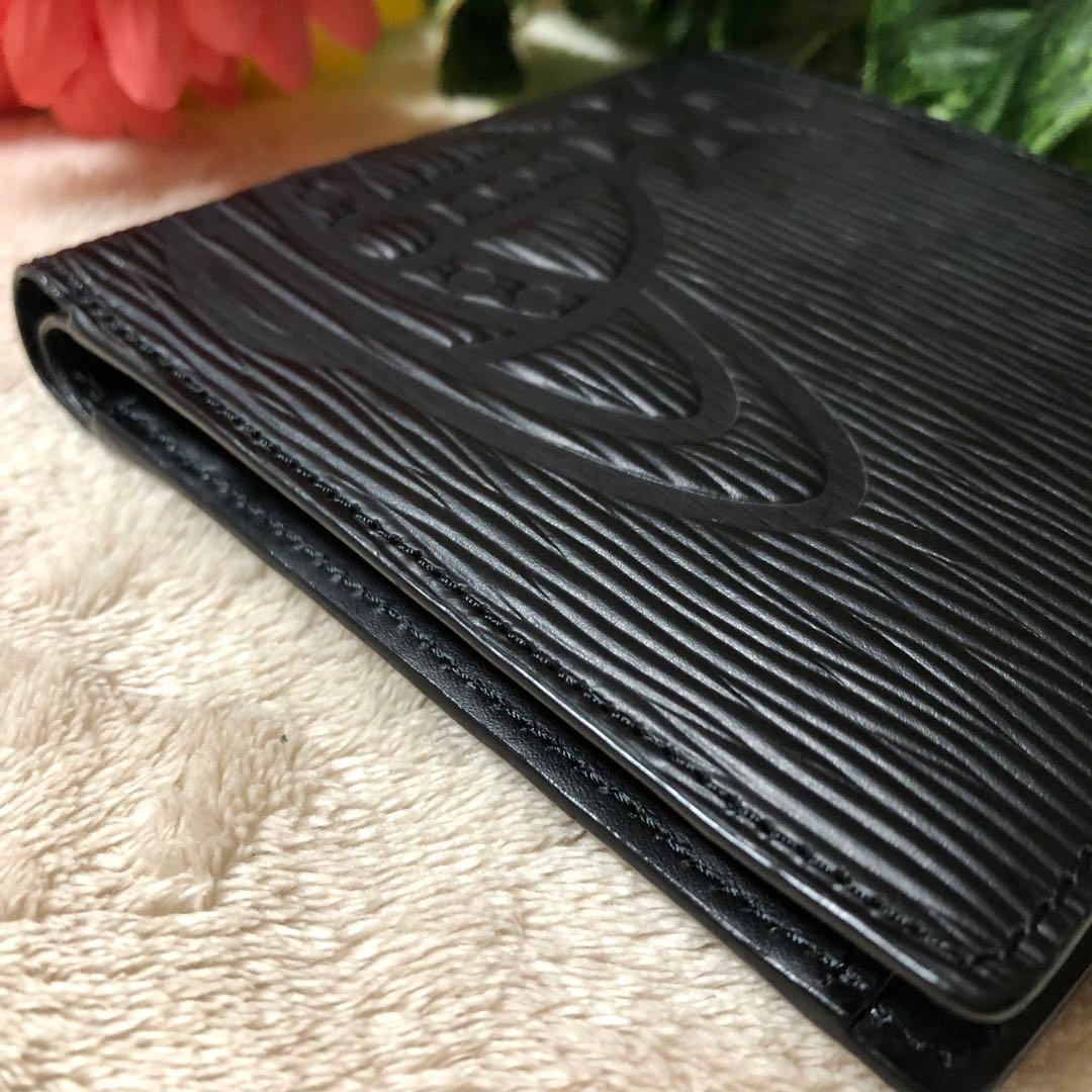 t.11010347.s　未使用　ヴィヴィアンウエストウッド　フロウ折財布