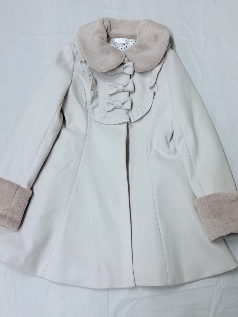 pium ピウム ヨークフリルリボンドーリーコート ピンク