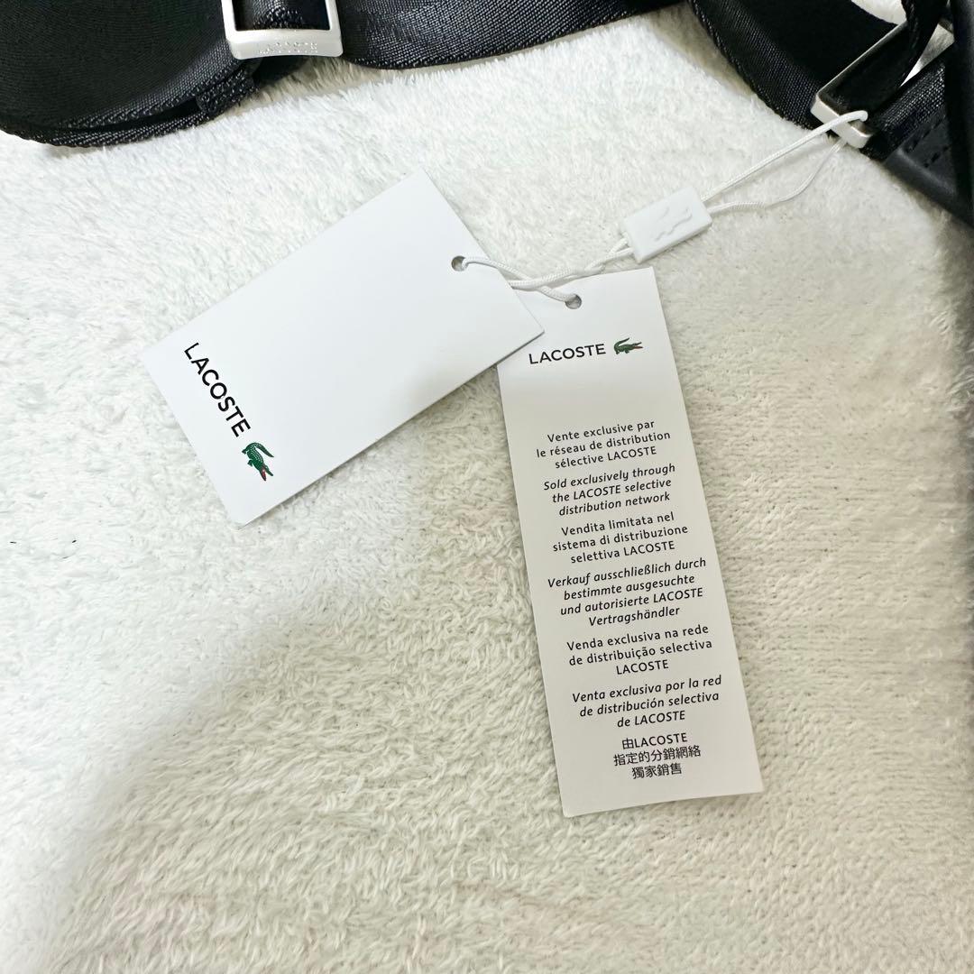 LACOSTE ザブレンド モノグラムフラップメッセンジャーバッグ 幾何学模様