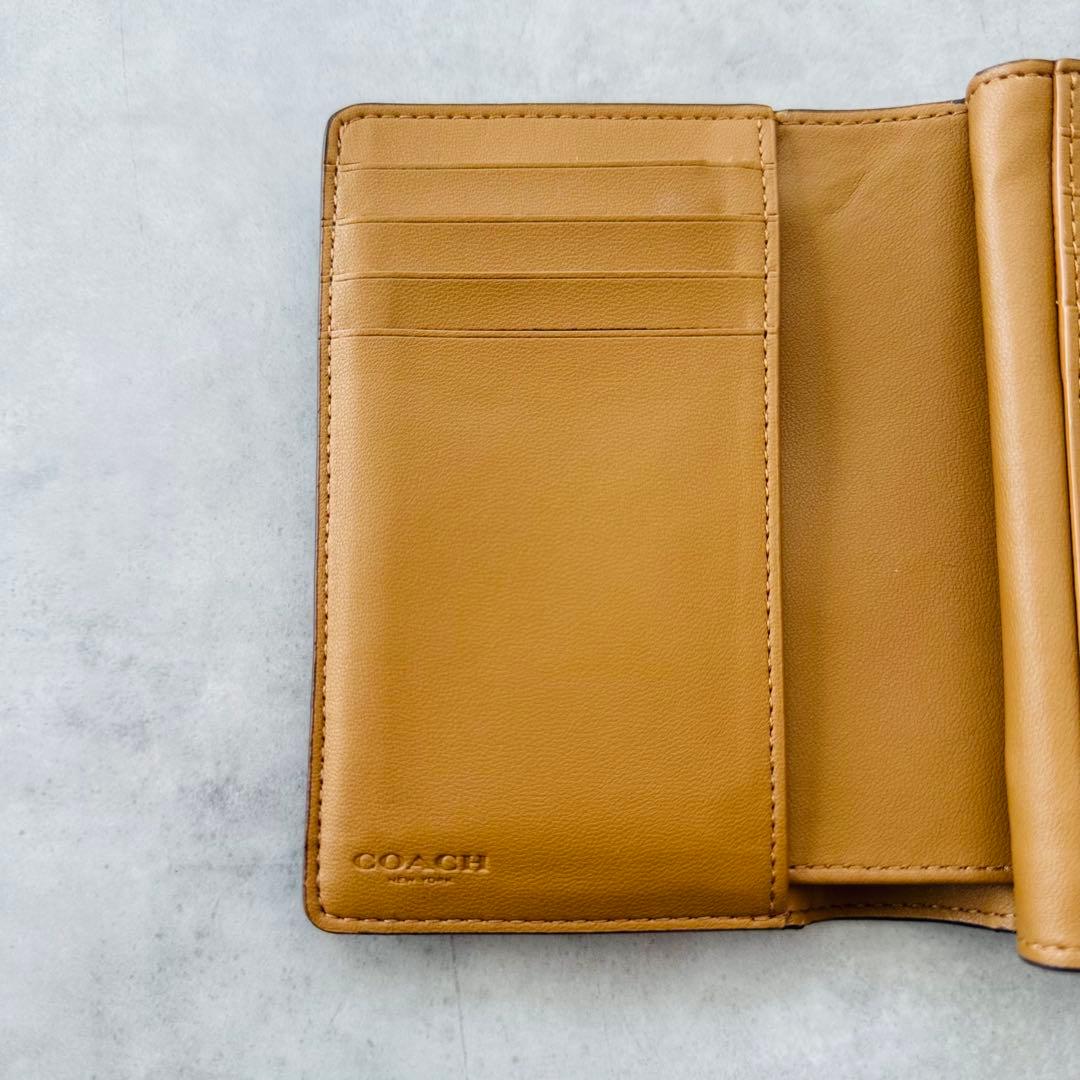 COACH シグネチャー ミディアム コーナー ジップ ウォレット カーキ×白