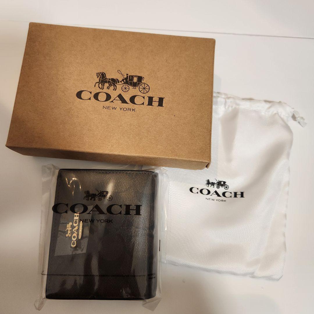​【新品・付属品】COACH 二つ折り財布 シグネチャー ブラウン チャーム付