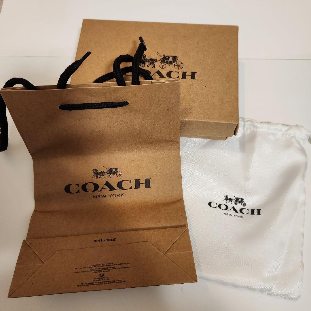 ​【新品・付属品】COACH 二つ折り財布 シグネチャー ブラウン チャーム付