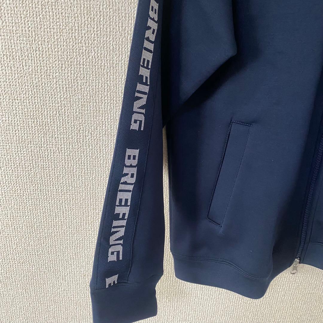 BRIEFING フルジップジャケット ネイビー 袖BRIEFINGロゴ入り