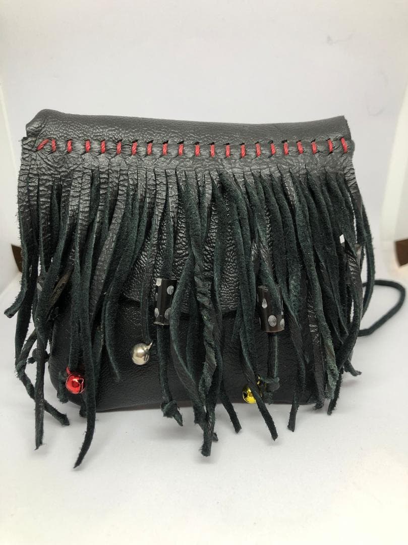 A58.フリンジ付きレザートートバッグ