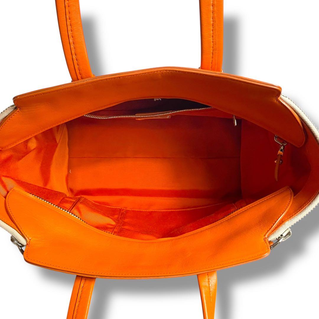 フェラガモ　トートバッグ　キャンバス×レザー　ガンチーニ　オレンジ　アリアナ