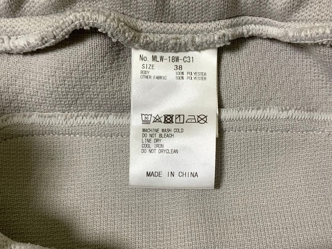 マークアンドロナレディースパンツ オレンジジッパー