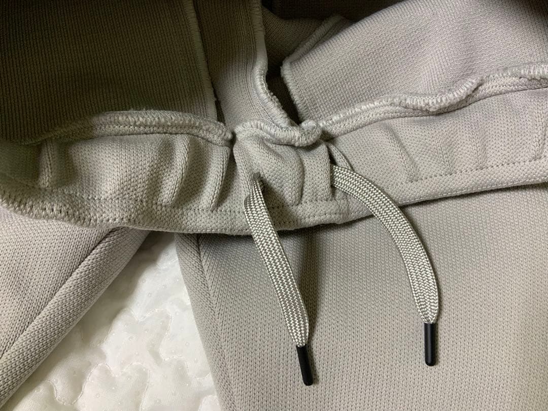 マークアンドロナレディースパンツ オレンジジッパー