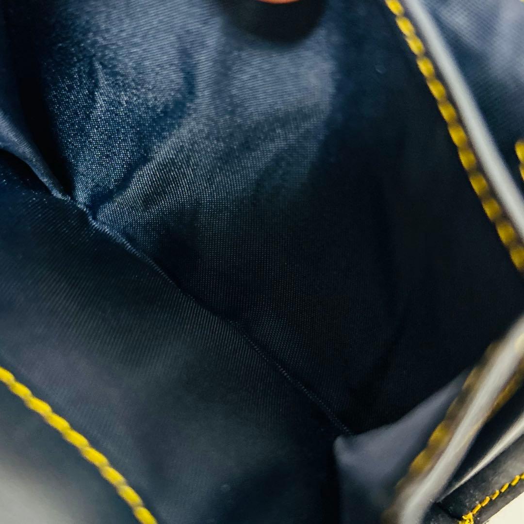 クリスチャンディオール 二つ折り財布 トロッター柄 サドル D金具 キャンバス