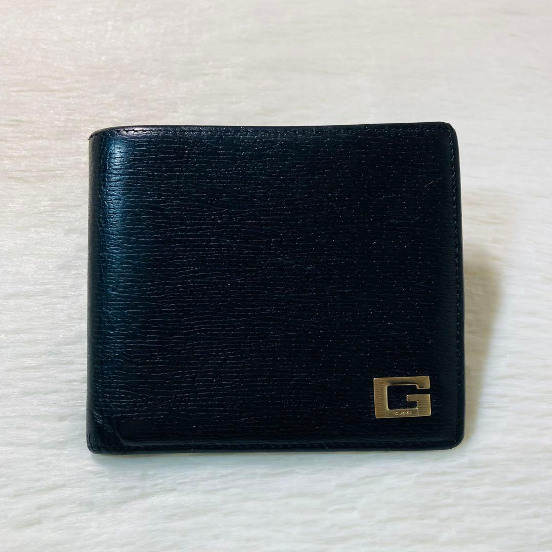 お買い得品　美品　GUCCI グッチ　二つ折り　レザー　ゴールドロゴ　人気　黒
