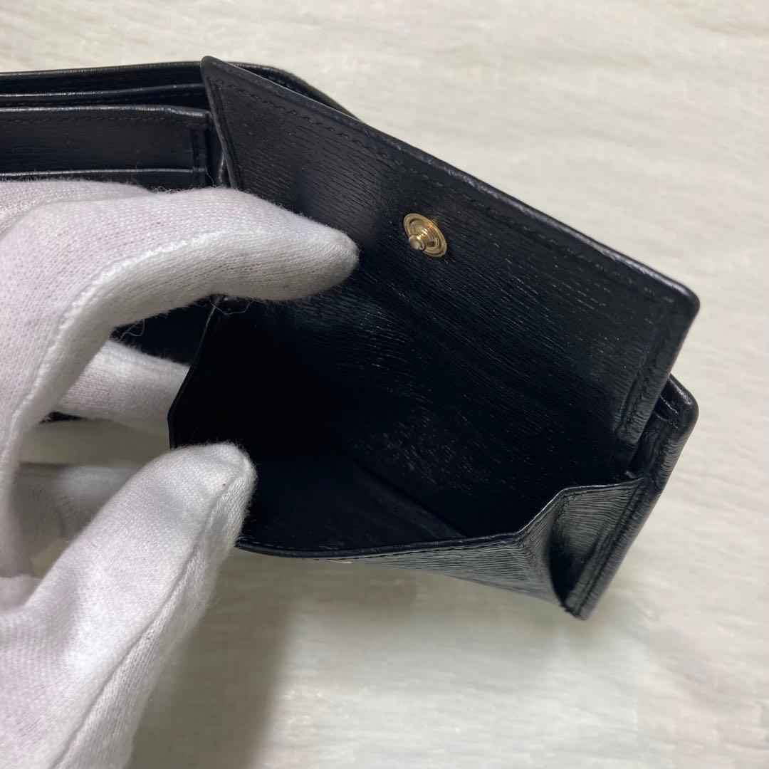 お買い得品　美品　GUCCI グッチ　二つ折り　レザー　ゴールドロゴ　人気　黒