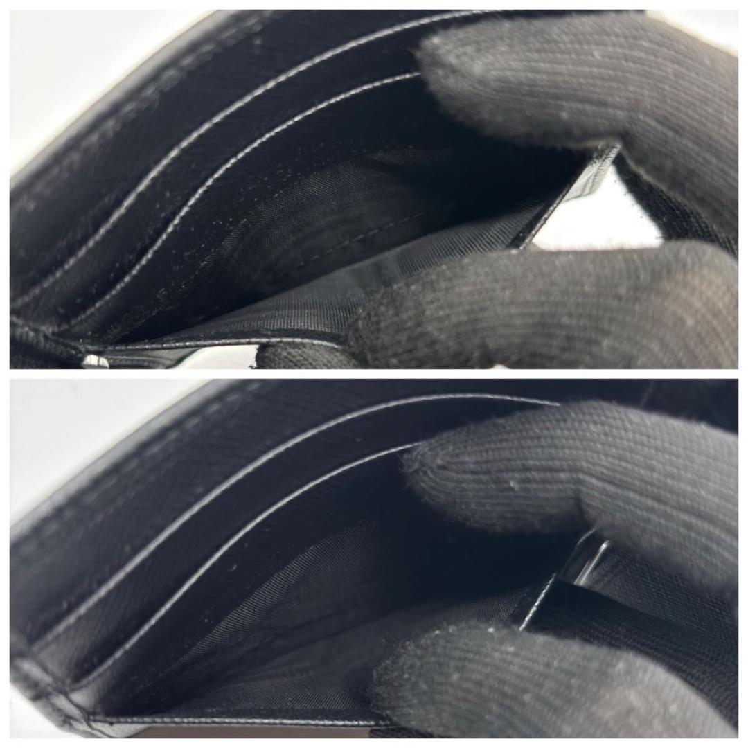 新品に近い プラダ 現行 マネークリップ サフィアーノ 三角プレート 黒