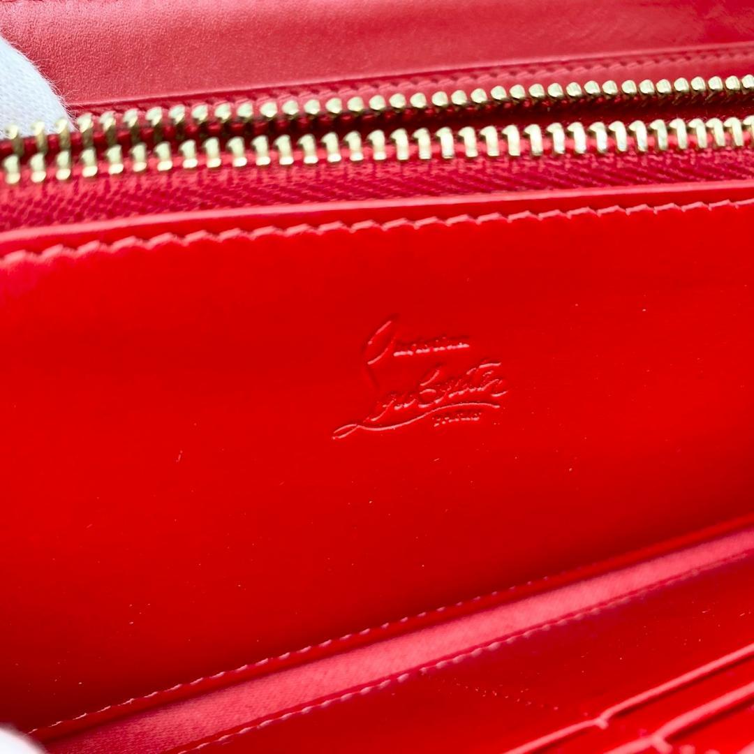 【CHRISTIAN LOUBOUTIN】 ラウンドジッピー　長財布　スタッズ