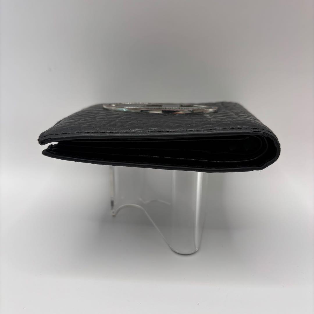 DIESEL 二つ折り財布　ブラック　型押し　D ロゴ　エンボス　シルバー