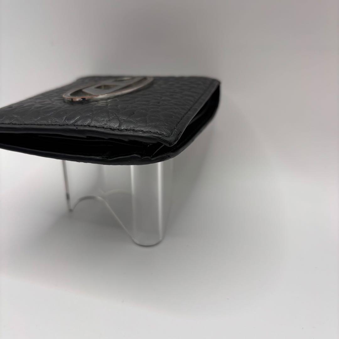 DIESEL 二つ折り財布　ブラック　型押し　D ロゴ　エンボス　シルバー