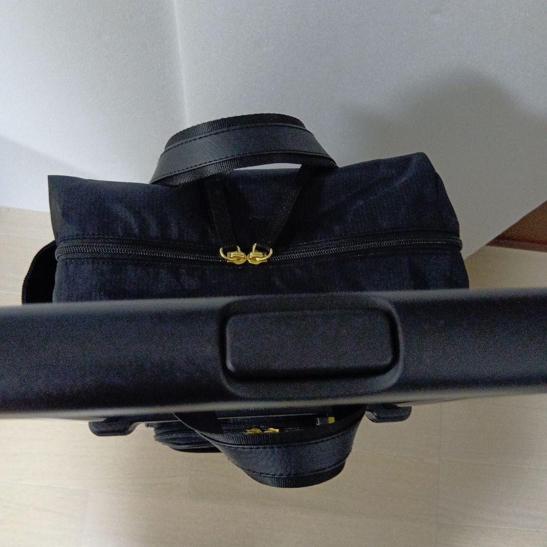 SWANY　スワニー4輪 キャリーバック　ケース 黒にリボン　ストッパー付き