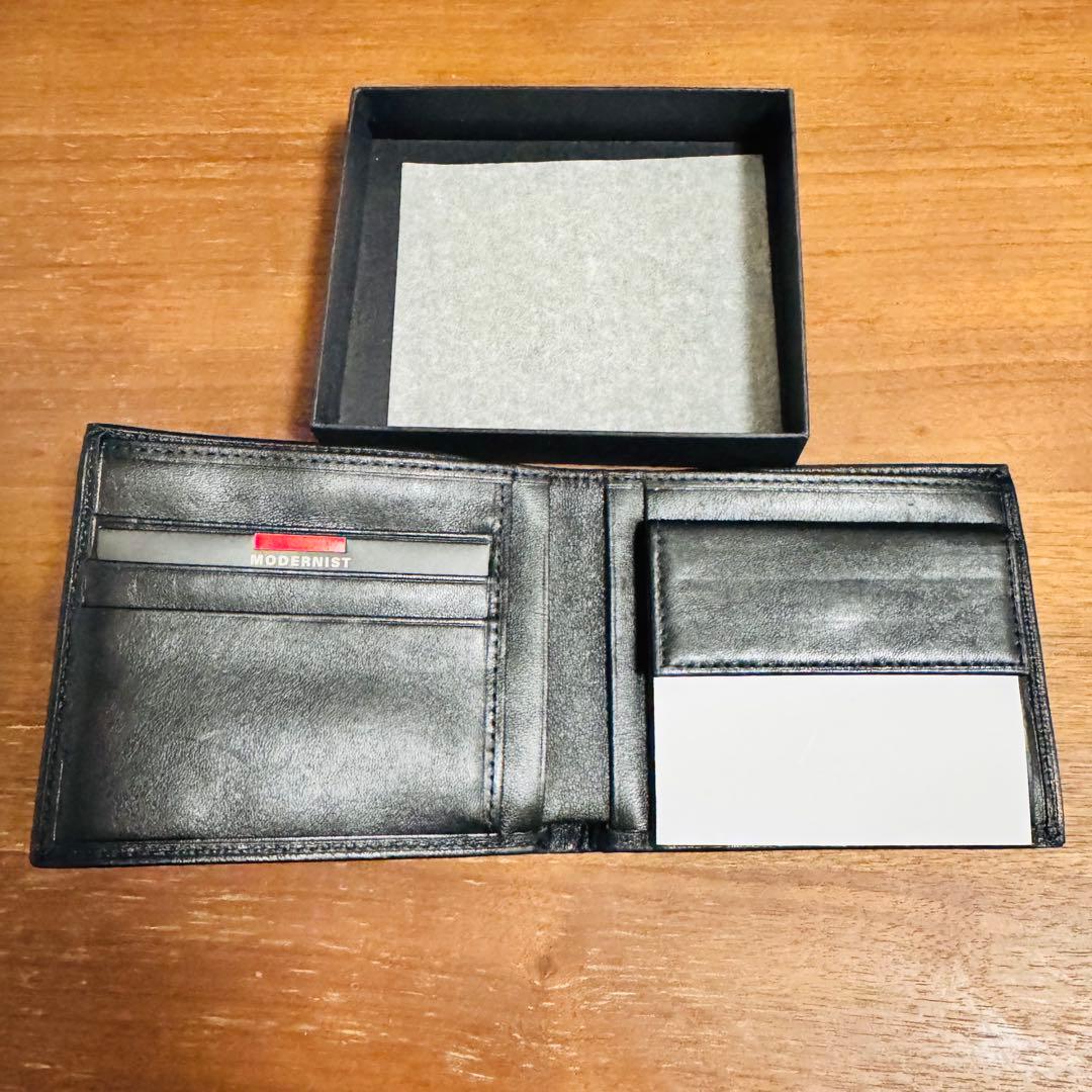 TUMI 二つ折り　財布　MODERIST 017099D