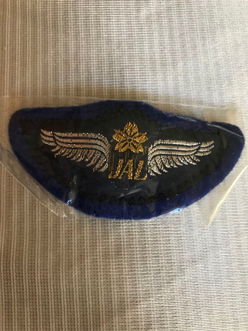 貴重　新品未使用　JALエプロン旧ロゴ入り　飛行機バッジ絵はがきなど付き　1点物