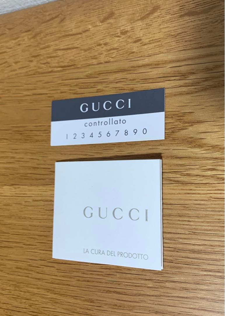 Gucci 財布　二つ折り　未使用　ホワイト　GGシマ