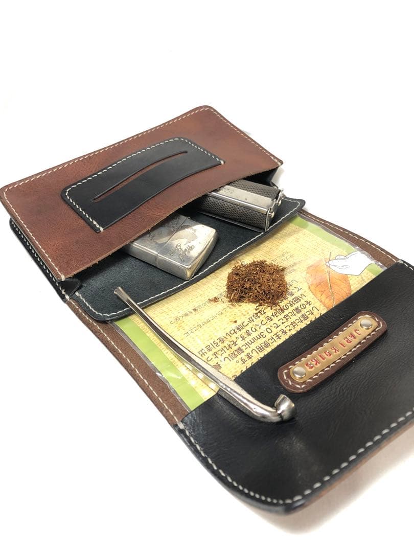 ツートンカラーがカジュアルなオイルヌメ革三つ折りシャグポーチ