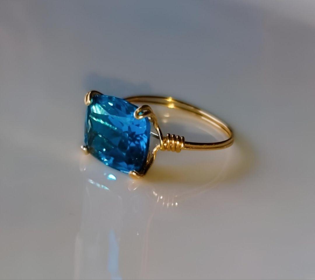 巨大 Kgf14 宝石ルース スイスブルートパーズ エメラルドカット 爪留め